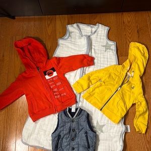 Bundle of 4  baby clothes.